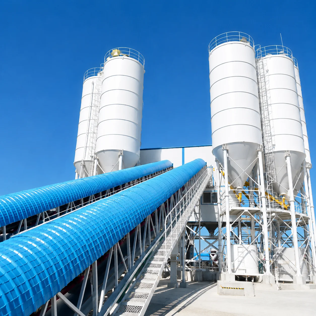Concrete mixer truck at a production plant